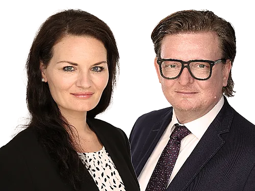 Das Bild zeigt zwei Mitarbeitende von Hiscox: Patrizia Baron und Marc Thamm